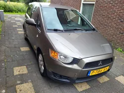 Grijs Gebruikt 2012 Mitsubishi Colt Edition Stationwagen | € 3.500
