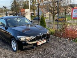 Zwart Gebruikt 2014 BMW 114 Hatchback | € 7.999 (Eerlijke prijs)