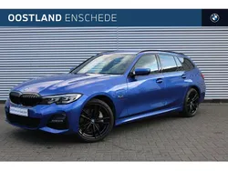 Blauw, metallic lak Gebruikt 2022 BMW 330 Executive Stationwagen | € 38.350 (Eerlijke prijs)