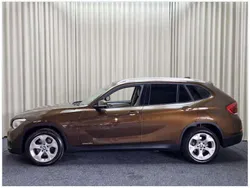 Bruin Gebruikt 2013 BMW X1 Executive SUV | € 12.000 (Goede deal)