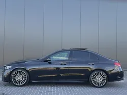 Zwart Gebruikt 2022 Mercedes C180 AMG line Sedan | € 43.995 (Eerlijke prijs)