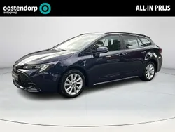 Blauw Gebruikt 2023 Toyota Corolla Hybrid Active Stationwagen | € 26.949