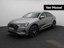 Grijs Gebruikt 2020 Audi e-tron Business SUV | € 30.900 (Eerlijke prijs)