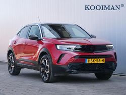 Rood, metallic lak Gebruikt 2024 Opel Mokka Ultimate SUV | € 25.895 (Eerlijke prijs)