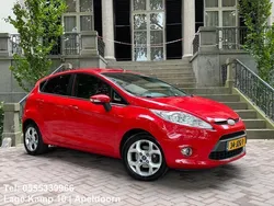 Rood, metallic lak Gebruikt 2009 Ford Fiesta Titanium Hatchback | € 4.445 (Goede deal)