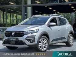 Gris highland (kqa) Gebruikt 2021 Dacia Sandero Comfort Hatchback | € 17.450 (Eerlijke prijs)