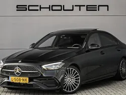 Zwart Gebruikt 2021 Mercedes C180 AMG line Sedan | € 42.900 (Eerlijke prijs)