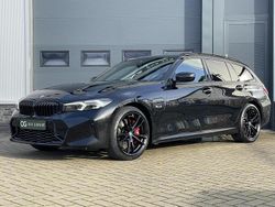 Zwart (metallic) Gebruikt 2022 BMW 320e M Sport Stationwagen | € 33.950 (Iets duurder)