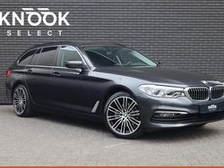 Grijs, metallic lak Gebruikt 2020 BMW 520 Executive Stationwagen | € 26.445 (Goede deal)