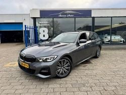 Grijs Gebruikt 2021 BMW 330 Executive Stationwagen | € 29.950 (Eerlijke prijs)