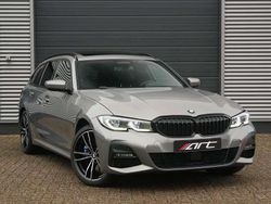 Grijs (metallic) Gebruikt 2021 BMW 330e Stationwagen | € 29.950 (Eerlijke prijs)