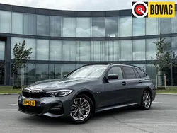 Grijs Gebruikt 2022 BMW 320e M Sport Stationwagen | € 34.880 (Goede deal)