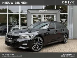 Zwart Gebruikt 2020 BMW 330e Executive Stationwagen | € 33.900 (Eerlijke prijs)