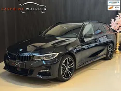 Zwart, metallic lak Gebruikt 2020 BMW 330e M Sport Stationwagen | € 35.990 (Iets duurder)
