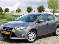Bruin Gebruikt 2012 Ford Focus Titanium Hatchback | € 6.999 (Eerlijke prijs)