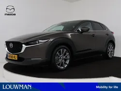 Titanium flash (bruin metallic) Gebruikt 2021 Mazda CX-30 Comfort SUV | € 26.945 (Eerlijke prijs)