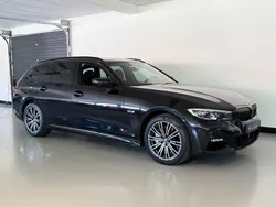 Zwart Gebruikt 2022 BMW 330 Executive Stationwagen | € 31.350 (Goede deal)