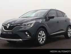 Twotone bleu marine / noir et Gebruikt 2021 Renault Captur Intens SUV | € 22.245 (Eerlijke prijs)