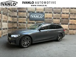Grijs Gebruikt 2021 BMW 330 Executive Stationwagen | € 31.800 (Eerlijke prijs)