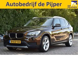 Bruin, metallic lak Gebruikt 2013 BMW X1 SUV | € 12.955 (Eerlijke prijs)