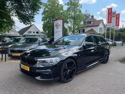 Zwart, metallic lak Gebruikt 2020 BMW 520 Executive Stationwagen | € 35.950 (Iets duurder)
