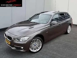 Bruin, metallic lak Gebruikt 2013 BMW 320 Executive Stationwagen | € 12.950 (Eerlijke prijs)
