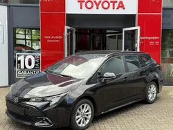 Zwart Gebruikt 2023 Toyota Corolla Hybrid Stationwagen | € 26.400