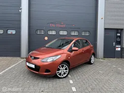 Oranje Gebruikt 2010 Mazda 2 Hatchback | € 4.499 (Goede deal)