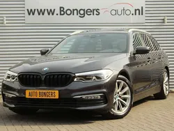 Grijs, metallic lak Gebruikt 2018 BMW 520 Executive Stationwagen | € 28.900 (Eerlijke prijs)