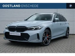 Grijs Gebruikt 2024 BMW 320e Comfort Edition Stationwagen | € 45.850 (Eerlijke prijs)