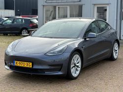 Grijs (metallic) Gebruikt 2021 Tesla Model 3 Standard Range Sedan | € 12.350