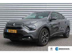 Grijs Gebruikt 2023 Citroën e-C4 Shine Sedan | € 20.900 (Eerlijke prijs)