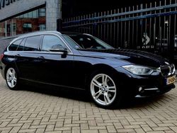 Blauw Gebruikt 2013 BMW 320 Executive Stationwagen | € 10.950 (Goede deal)