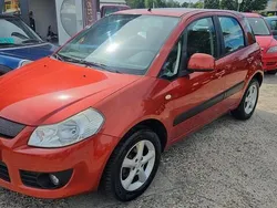 Oranje Gebruikt 2007 Suzuki SX4 MPV | € 4.299 (Eerlijke prijs)