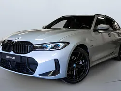 Grijs Gebruikt 2023 BMW 330e M Sport Stationwagen | € 45.850 (Super prijs)
