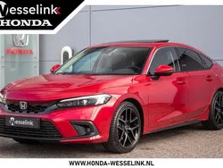 Rood, metallic lak Gebruikt 2023 Honda Civic Advance Hatchback | € 37.950