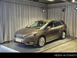 Bruin, metallic lak Gebruikt 2018 Ford Focus Titanium Stationwagen | € 12.945 (Eerlijke prijs)