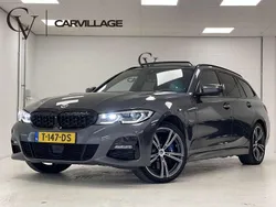 Grijs Gebruikt 2022 BMW 330e M Sport Stationwagen | € 39.445 (Goede deal)