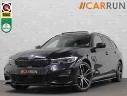 Zwart (metallic) Gebruikt 2021 BMW 330e M Sport Stationwagen | € 34.800 (Eerlijke prijs)