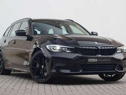 Zwart Gebruikt 2021 BMW 330e Sport Line Stationwagen | € 28.950 (Goede deal)