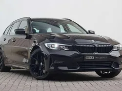 Zwart Gebruikt 2021 BMW 330e Sport Line Stationwagen | € 28.950 (Goede deal)