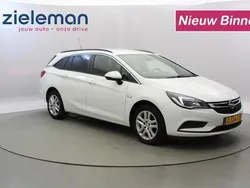 Wit, metallic lak Gebruikt 2019 Opel Astra Business Stationwagen | € 10.840 (Goede deal)