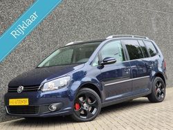 Blauw Gebruikt 2014 VW Touran Highline MPV | € 12.995 (Eerlijke prijs)