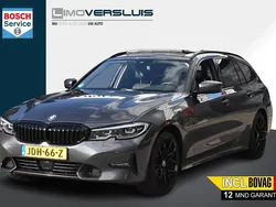 Grijs Gebruikt 2022 BMW 330e Executive Stationwagen | € 35.950 (Goede deal)