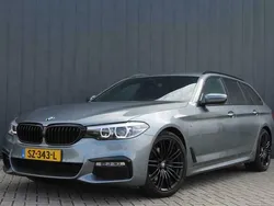 Grijs, metallic lak Gebruikt 2018 BMW 520 Executive Stationwagen | € 29.999 (Iets duurder)