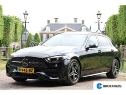 Zwart Gebruikt 2022 Mercedes C300e AMG Stationwagen | € 36.900 (Eerlijke prijs)