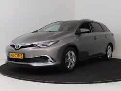 Bruin Gebruikt 2015 Toyota Auris Hybrid Stationwagen | € 13.950 (Eerlijke prijs)