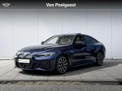 Blauw Gebruikt 2024 BMW i4 Executive Sedan | € 58.900 (Goede deal)