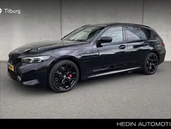 Zwart Nieuw 2025 BMW 330e Stationwagen | € 70.880