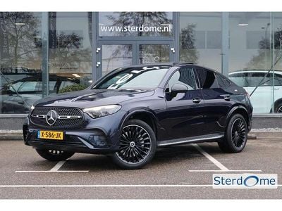 Blauw Occasion 2023 Mercedes GLC300e AMG line Coupé | € 72.995 (Eerlijke prijs)